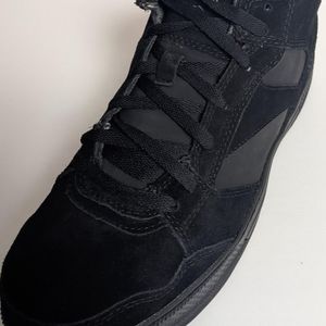 Men's skateboard protective work shoe. Reebok black on black